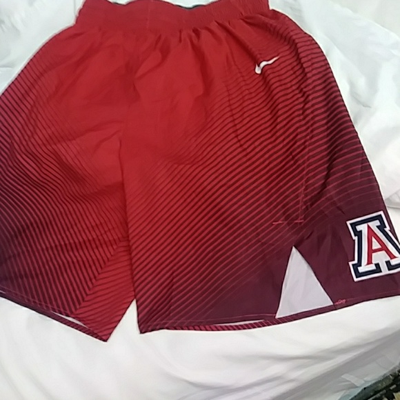 basketball shorts with team logo on front